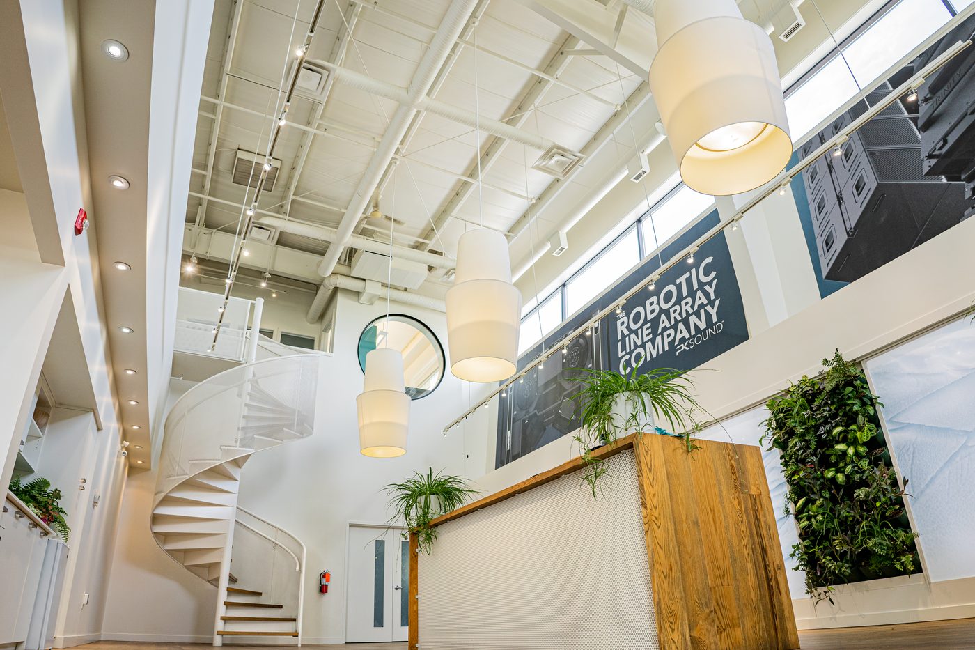 The PK Sound headquarters office atrium and staircase